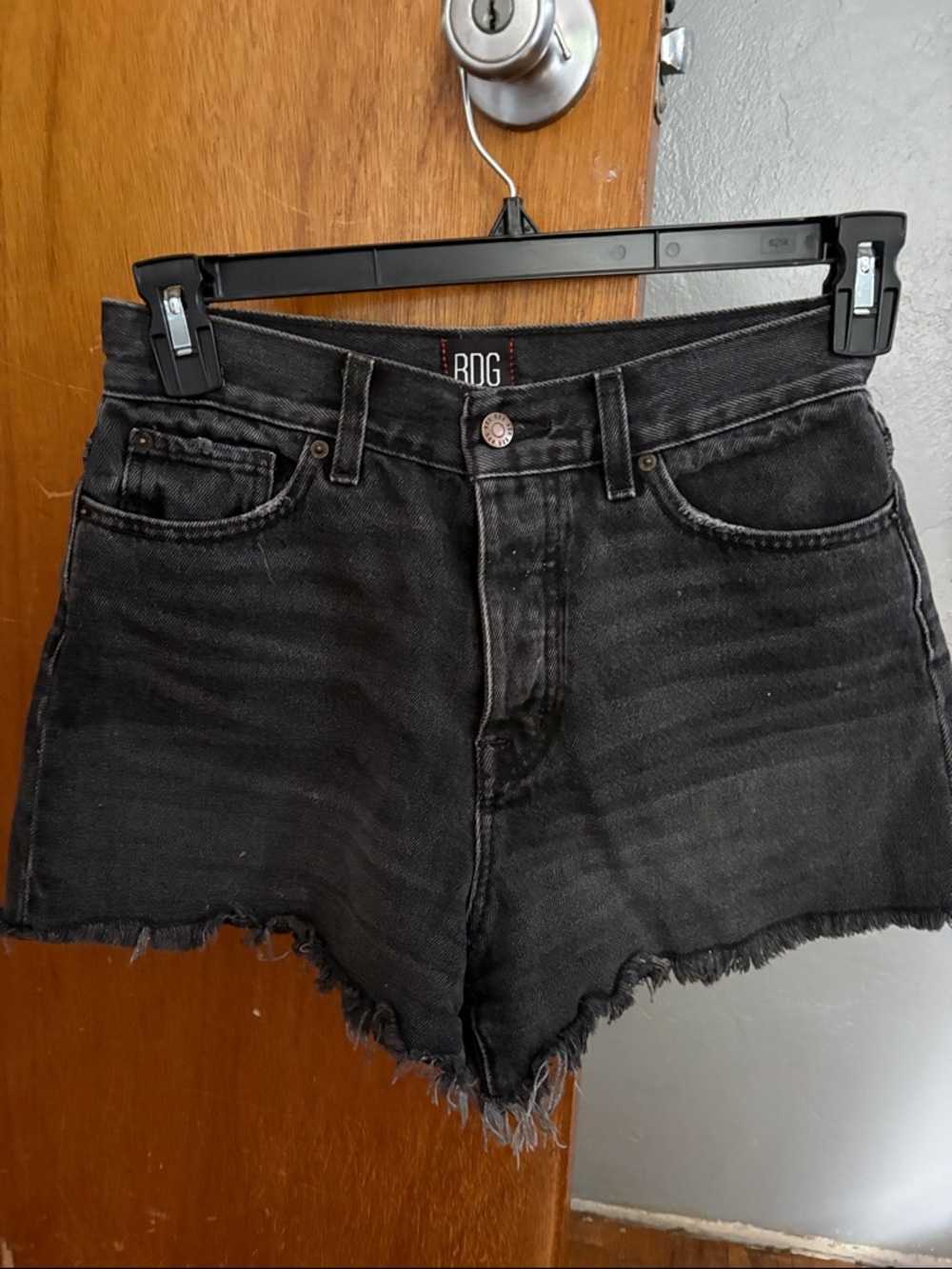 BDG Black High-Rise Frayed Hem Denim Shorts.